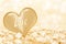 Word love written on a gold heart, shiny background