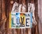 Word love written with recycled US license plates