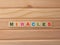 Word Miracles on wood