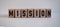 Word MISSION, inscription on wooden cubes on white background