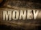 The word Money on paper background