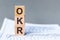 Word OKR made with wood building blocks, stock image