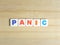 Word Panic on wood background