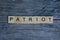 Word patriot of wooden letters