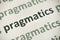 Word pragmatics printed on paper macro