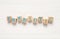 Word Prebiotic made of cubes with letters on white wooden table, top view