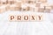 The Word Proxy Formed By Wooden Blocks On A White Table