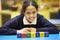 Word Reading Spelt In Wooden Blocks With Pupil Behind