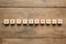 Word Referendum of cubes on wooden table, flat lay