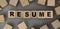 The word Resume made from wooden cubes. Conceptual photo