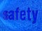 The word safety in the background numbers one and zero