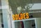 A word Sales (Soldes in french ) on the window of a store