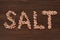 Word Salt written in pink Hymalayan salt crystals