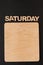 Word Saturday with blank wooden board