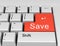 Word Save is written on a computer keyboard. Conceptual image on a computer key Enter
