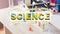 Word science and components on chemistry laboratory background