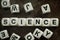 Word science on toy cubes