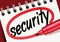 The word security noted on a notebook with a red marker