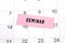 The word Seminar written on a pink sticky note posted on a calendar or planner page. Closeup of a personal agenda