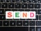 Word Send on keyboard background