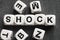 Word shock on toy cubes