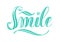 The word Smile written in script hand lettering.