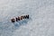 The word snow from wooden letters