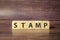 word stamp made with wooden block and brown background