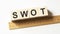 Word SWOT made with wood building blocks