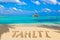 Word Tahiti on beach