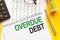 Word text OVERDUE DEBT on white paper card, business concept