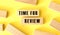 The word TIME FOR RENEW is written on a wooden blocks on a yellow background