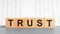 Word trust on grey table for your desing, concept