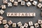 the word variable wooden cubes with burnt letters