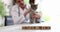 Word veterinary medicine on wooden cubes on background of doctor and kitten closeup 4k movie slow motion