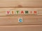 Word Vitamin C on wood