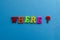 Word where from plastic magnetic letters on blue background