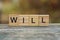 Word will of brown wooden letters