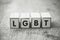 word on wooden cube on wooden desk background concept - LGBT