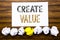 Word, writing Create Value. Concept for Creating Motivation Written on sticky note paper reminder, wooden background with sticky,