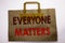 Word, writing Everyone Matters. Business concept for Equality Respect Written on shopping bag, white isolated background.