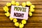 Word, writing Movie Night. Business concept for Wathing Movies written on sticky note paper on the wooden background.