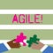 Word writing text Agile. Business concept for Develop an agility towards technological chnage Two Hands Holding Colorful