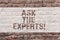 Word writing text Ask The Experts. Business concept for Look for a professional advice consultation support Brick Wall