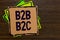 Word writing text B2B B2C. Business concept for two types for sending emails to other people Outlook accounts Paper notes Importan