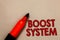 Word writing text Boost System. Business concept for Rejuvenate Upgrade Strengthen Be Healthier Holistic approach Open red marker