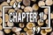 Word writing text Chapter 1. Business concept for Starting something new or making a big changes in ones journey Wooden background