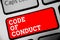 Word writing text Code Of Conduct. Business concept for Ethics rules moral codes ethical principles values respect Keyboard red ke