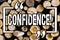 Word writing text Confidence. Business concept for Never ever doubting your worth,inspire and transform yourself Wooden background