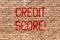 Word writing text Credit Score. Business concept for Capacity to repay a loan Creditworthiness of an individual Brick